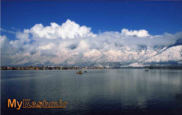 Lake mountain boats clouds sky free wallpaper - medium preview image