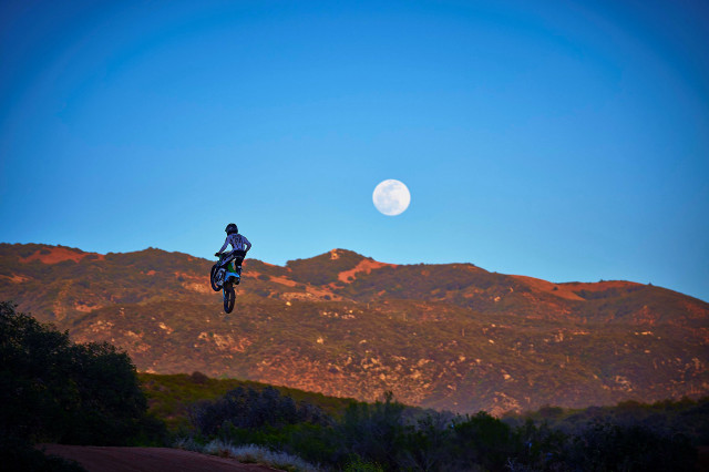 Motorcycle jump hill full moon free wallpaper - medium preview image