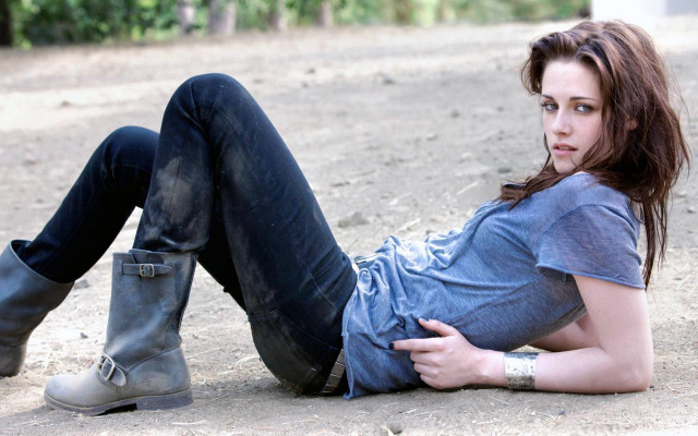 Woman lying crossed legs boots free wallpaper - medium preview image