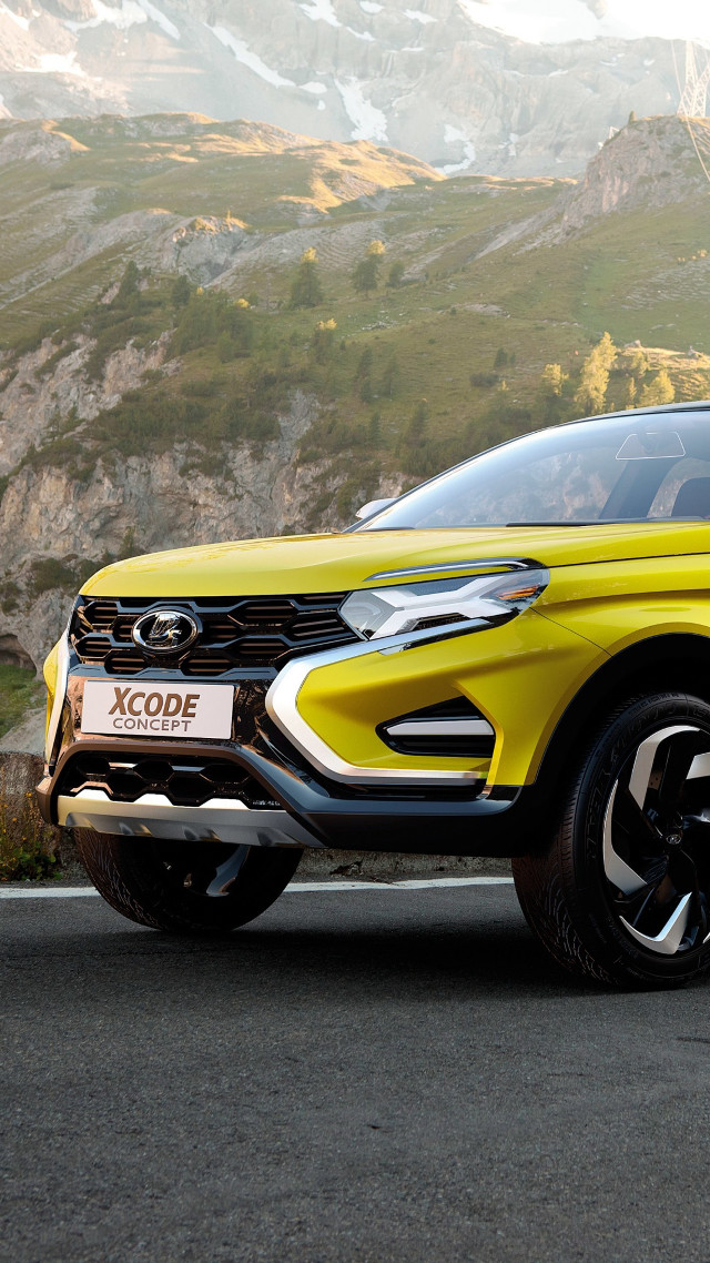 Yellow suv parked road mountain free wallpaper - medium preview image