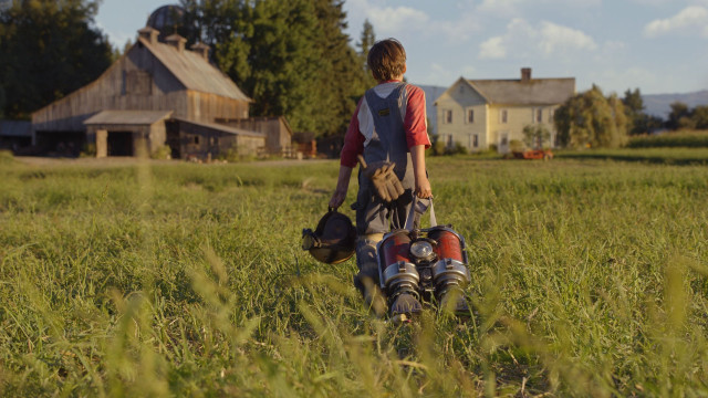 Person walking backpack field grass free wallpaper - medium preview image