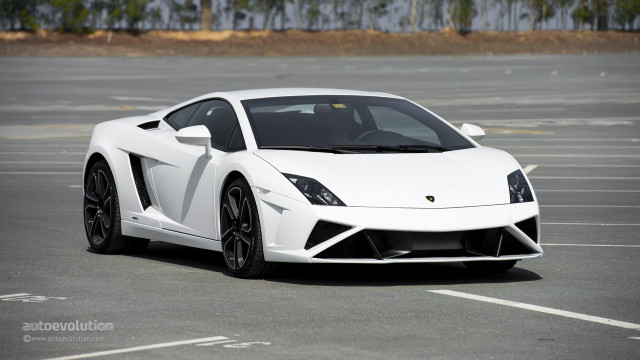 White sports car parking lot #38 free wallpaper - medium preview image