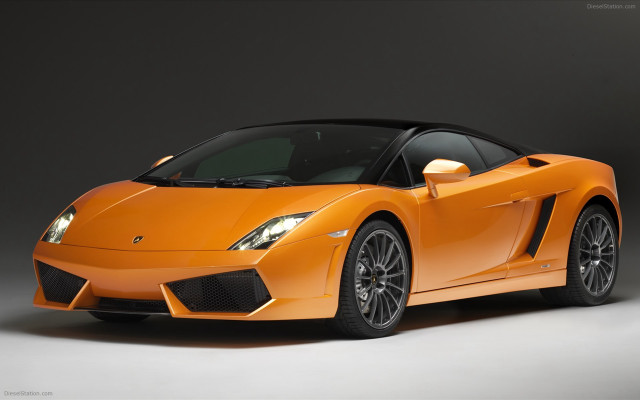 Orange sports car dark room #13 free wallpaper - medium preview image