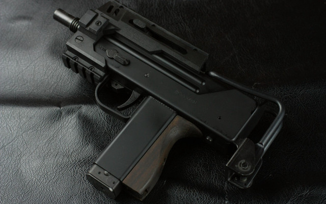 Gun black leather background vector free wallpaper - medium preview image