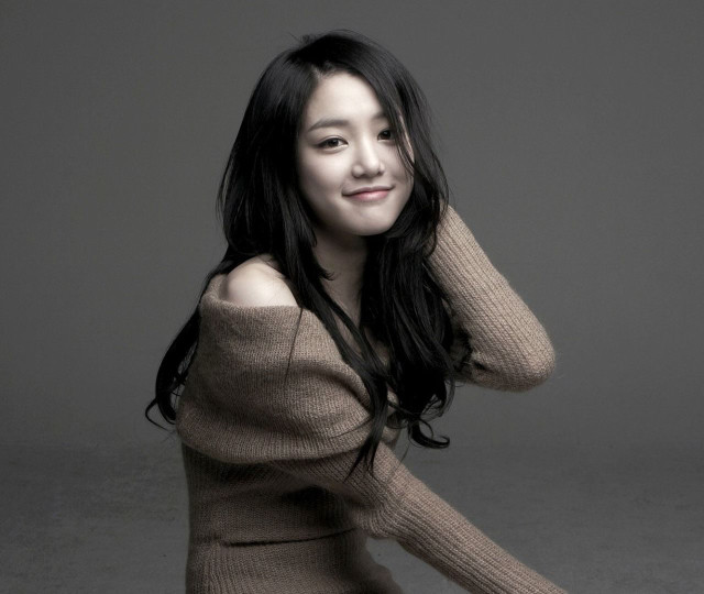 Woman sweater jeans fishnets photorealistic free wallpaper - medium preview image
