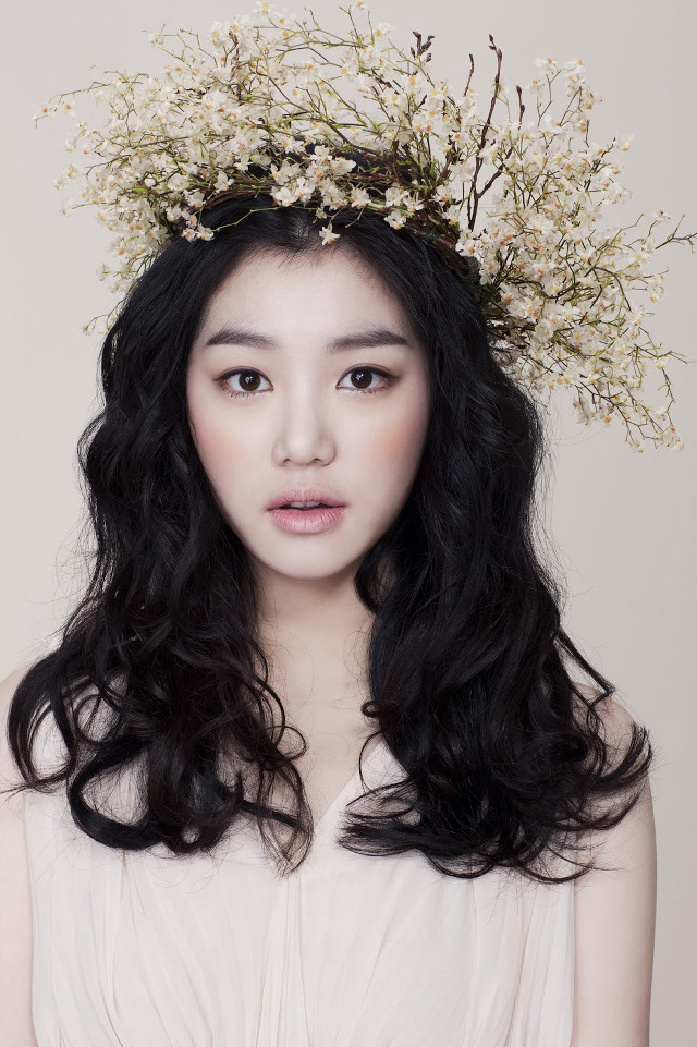 Woman long black hair flower free wallpaper - medium preview image