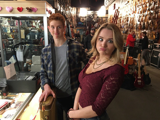 Woman boy store guitars man free wallpaper - medium preview image