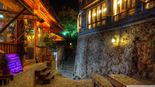 Stone building lit sign night free wallpaper - medium preview image