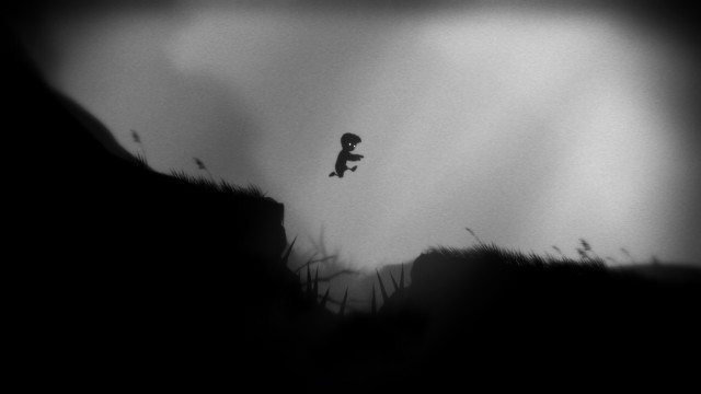 Person jumping cliff kite dark free wallpaper - medium preview image