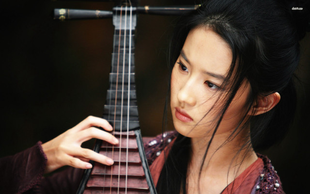 Woman holding guitar string neck free wallpaper - medium preview image