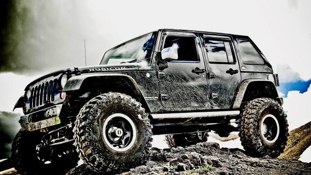 Black jeep rocky hillside cloudy free wallpaper - medium preview image