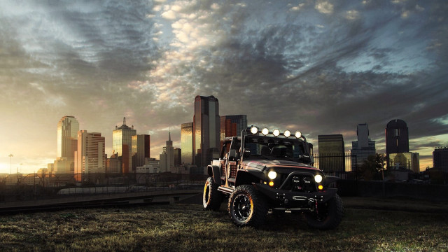 Jeep parked field city sunset free wallpaper - medium preview image