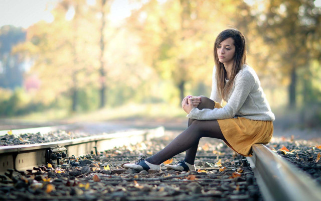 Train track woman autumn blurry free wallpaper - medium preview image
