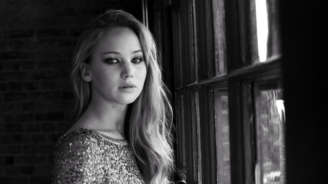 Woman window brickwall serious look free wallpaper - medium preview image