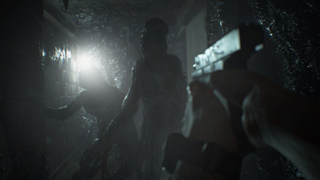 Person holding gun dark room free wallpaper - medium preview image