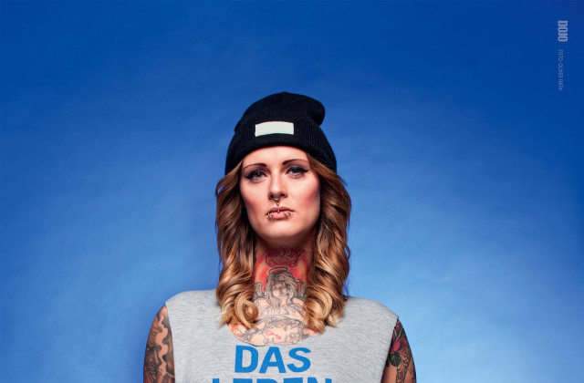 Woman tattooed face hat blue free wallpaper - medium preview image