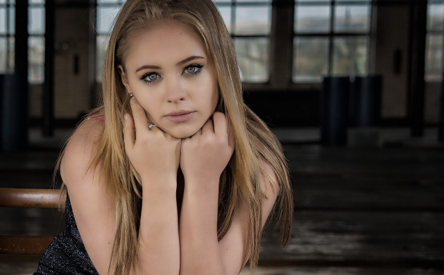 Woman sitting chair hands face #2 free wallpaper - medium preview image