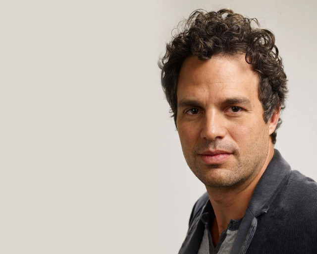 Curly haired man black jacket free wallpaper - medium preview image