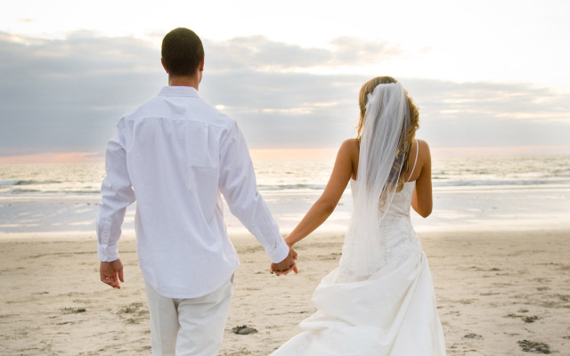 Bride groom walking beach holding #2 free wallpaper - medium preview image