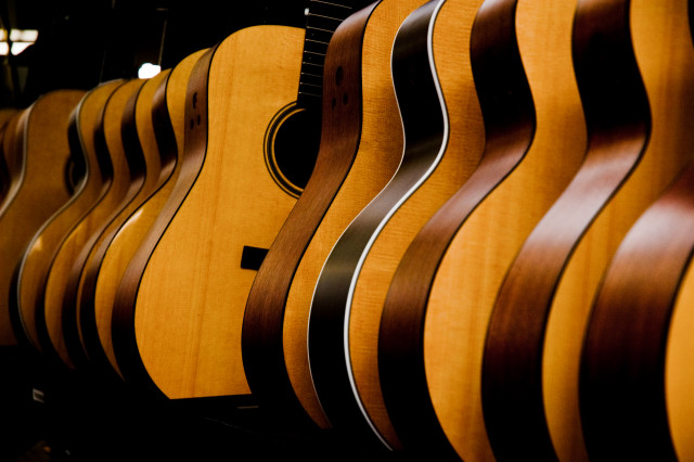Guitars row brown black stripe free wallpaper - medium preview image
