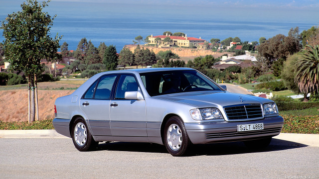 Silver car road hill ocean free wallpaper - medium preview image