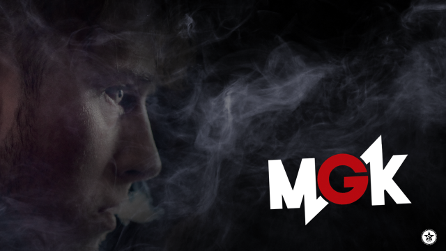 Man smoking cigarette gk logo free wallpaper - medium preview image