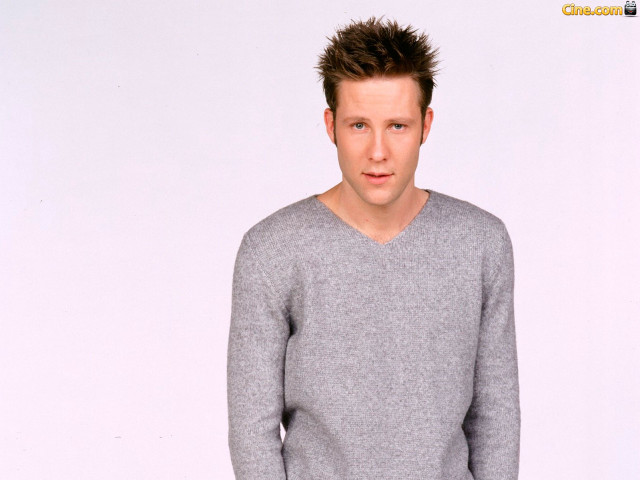 Man mohawk gray sweater jeans free wallpaper - medium preview image