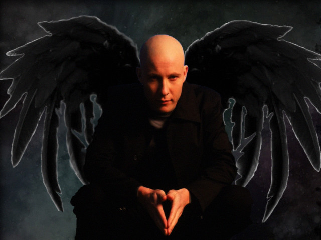 Bald man black wings sitting free wallpaper - medium preview image