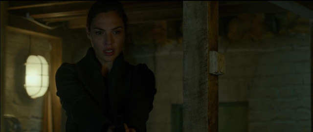 Woman black coat holding gun free wallpaper - medium preview image