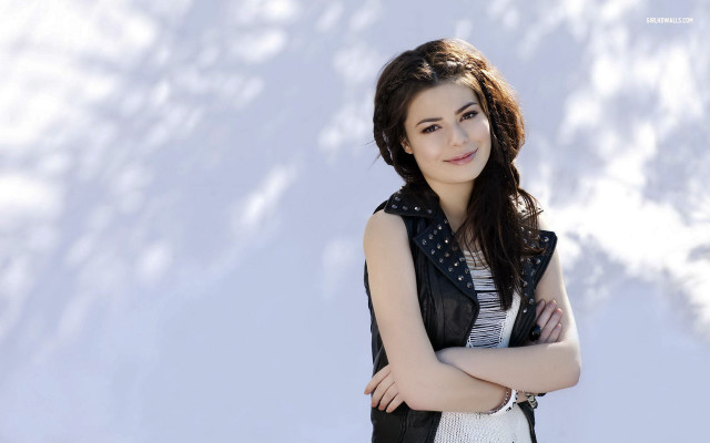 Woman standing snow covered mountain free wallpaper - medium preview image