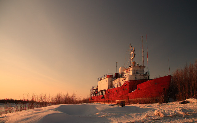 Large red boat snow field free wallpaper - medium preview image