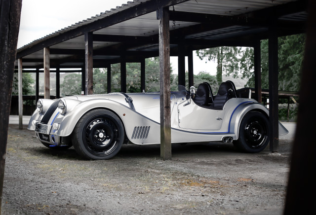 White car covered parking lot free wallpaper - medium preview image