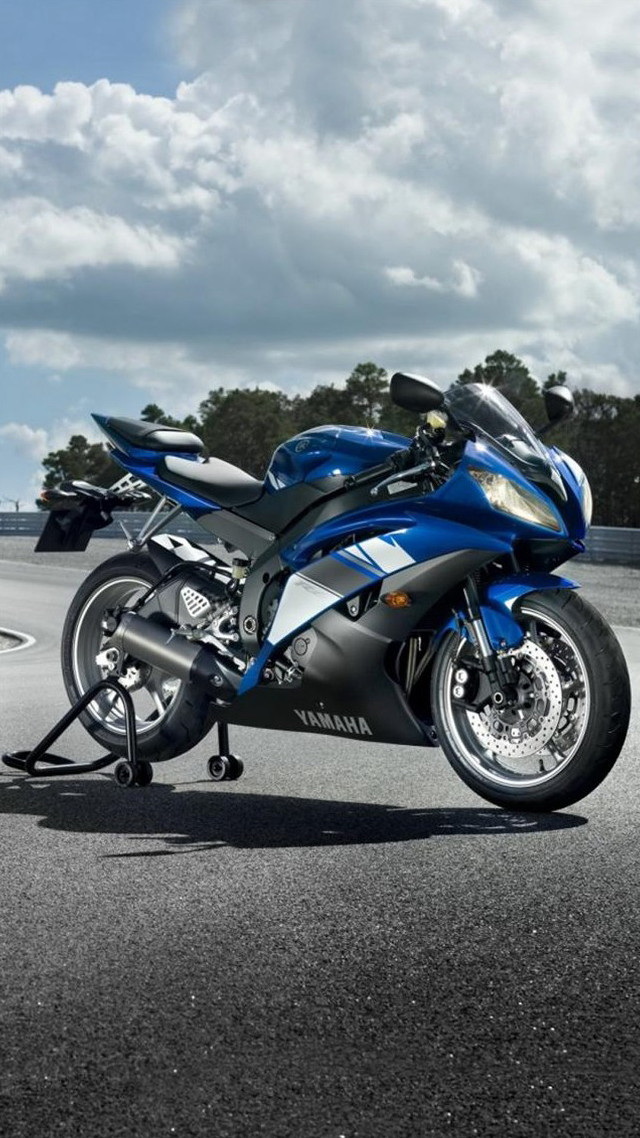 Blue motorcycle parking lot building #2 free wallpaper - medium preview image