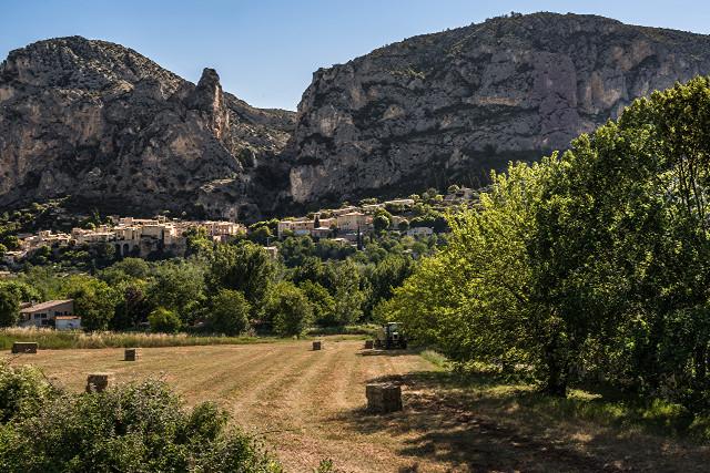 Hay bales mountain village sky free wallpaper - medium preview image