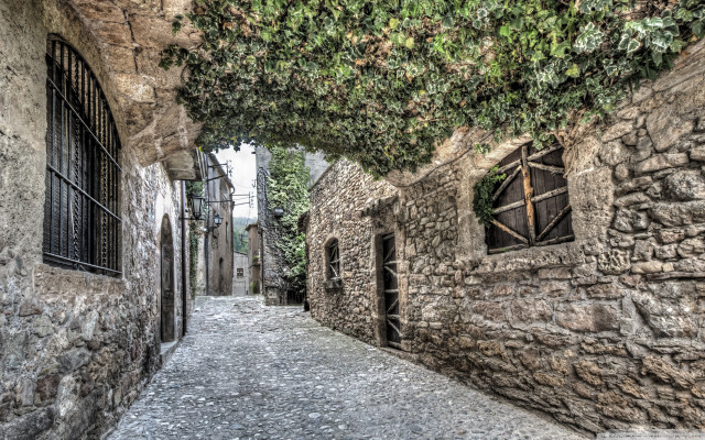 Narrow alley stone building tree free wallpaper - medium preview image