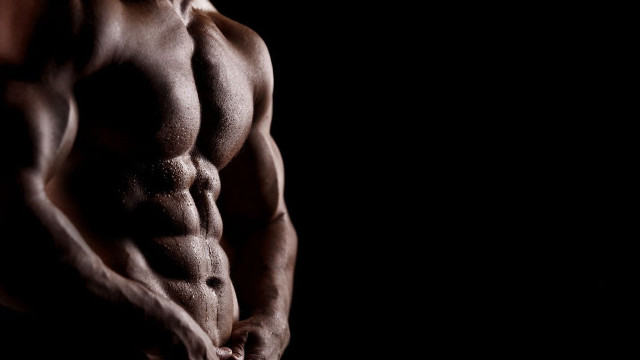 Muscular man dark hands in free wallpaper - medium preview image