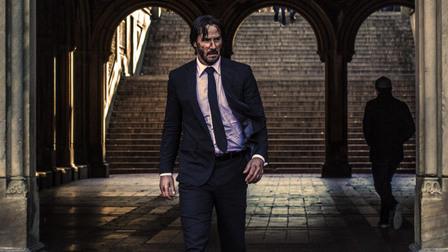 Man suit tie walking hallway free wallpaper - medium preview image