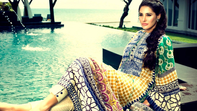Woman sitting ledged pool water free wallpaper - medium preview image