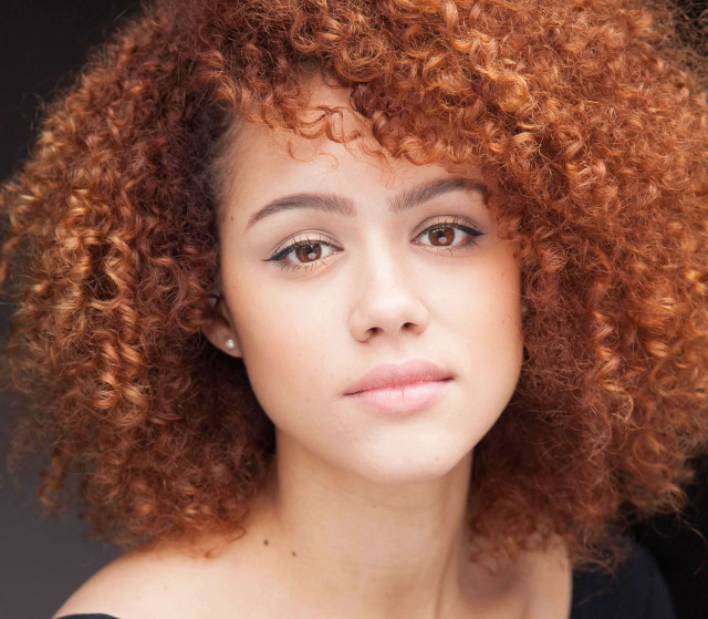 Woman red curly hair black free wallpaper - medium preview image