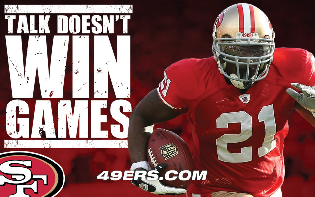 Man holding football sign says free wallpaper - medium preview image