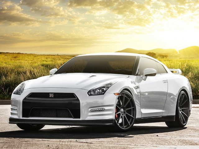 White sports car parking lot #33 free wallpaper - medium preview image