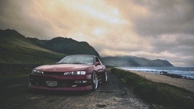 Red car parked ocean mountains #2 free wallpaper - medium preview image