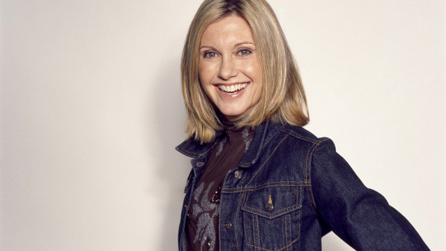Woman jean jacket smiling portrait free wallpaper - medium preview image