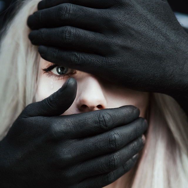 Woman black gloves covering face free wallpaper - medium preview image