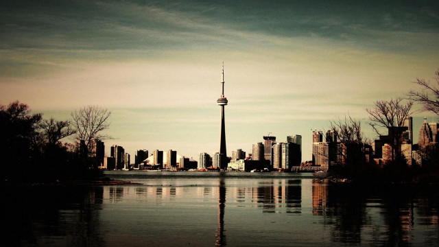 City lake tower cloudy skyline free wallpaper - medium preview image