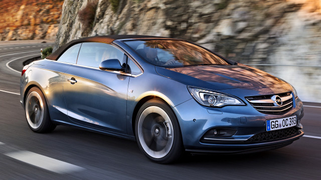 Blue opel car driving cliff free wallpaper - medium preview image