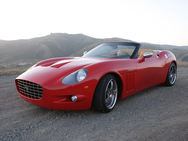 Red sports car gravel road #2 free wallpaper for desktop - medium preview image