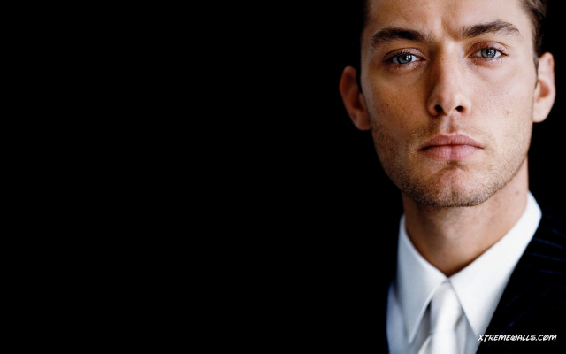 Man suit tie serious expression #7 free wallpaper - medium preview image
