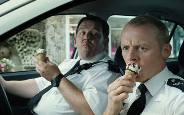 Two men uniform eating ice free wallpaper - medium preview image
