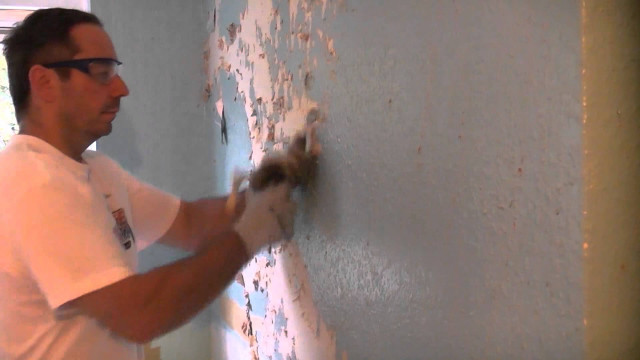 Man painting wall roller brush #2 free wallpaper - medium preview image